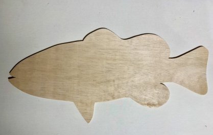 The flat, wooden fish blank each artist will receive.
